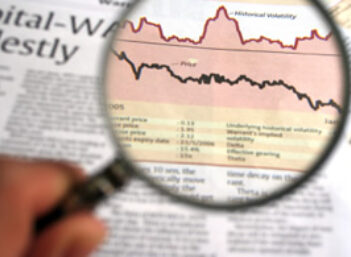 magnifying_newspaper